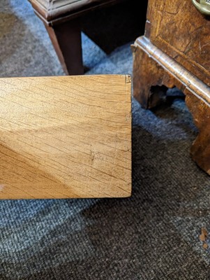Lot 34 - A George II walnut and feather-banded kneehole desk