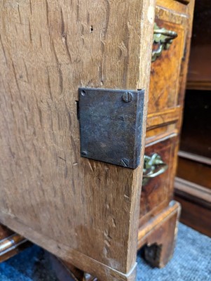 Lot 34 - A George II walnut and feather-banded kneehole desk