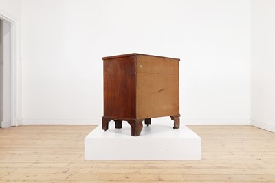 Lot 34 - A George II walnut and feather-banded kneehole desk