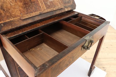 Lot 345 - A George I walnut and feather-banded architect's desk