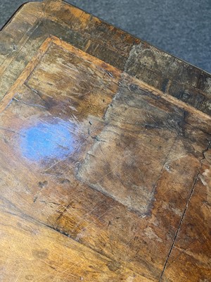 Lot 345 - A George I walnut and feather-banded architect's desk