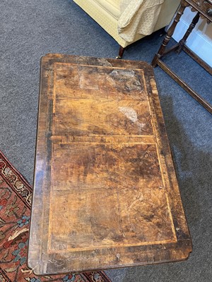 Lot 345 - A George I walnut and feather-banded architect's desk