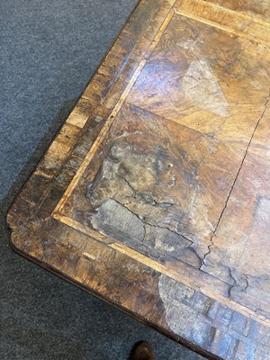 Lot 345 - A George I walnut and feather-banded architect's desk