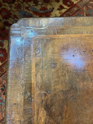 Lot 345 - A George I walnut and feather-banded architect's desk