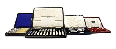 Lot 68 - A cased set of twelve French silver pickle or oyster forks