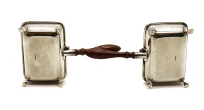 Lot 63 - A pair of silver warmers or silent butlers