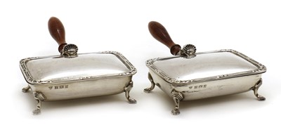 Lot 63 - A pair of silver warmers or silent butlers