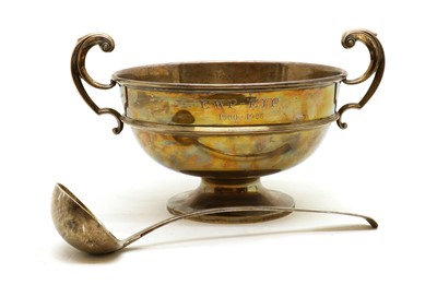 Lot 33 - A large twin handled silver presentation bowl