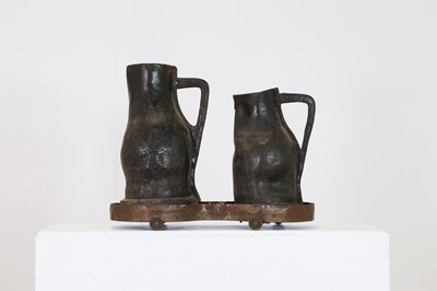 Lot 379 - Two large leather flagons or blackjacks