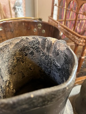 Lot 379 - Two large leather flagons or blackjacks