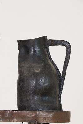 Lot 379 - Two large leather flagons or blackjacks