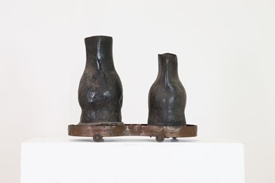 Lot 379 - Two large leather flagons or blackjacks