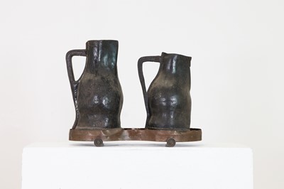 Lot 379 - Two large leather flagons or blackjacks