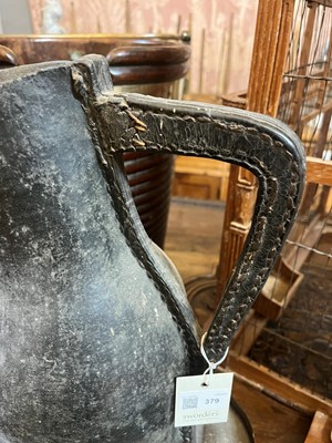 Lot 379 - Two large leather flagons or blackjacks