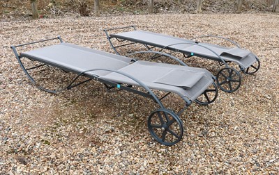 Lot 557 - A pair of contemporary sun loungers