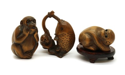 Lot 184 - Three Japanese wood netsuke