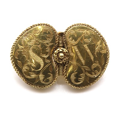 Lot 109 - A gold buckle