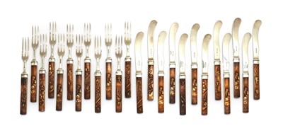 Lot 30A - A set of twelve silver and copper fish knives and forks