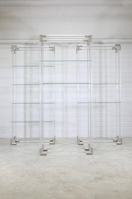 Lot 528 - A set of three tubular acrylic bookcases