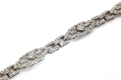 Lot 40 - A cased Art Deco diamond set plaque bracelet, c.1925