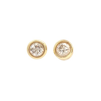 Lot 80 - A pair of single stone diamond stud earrings