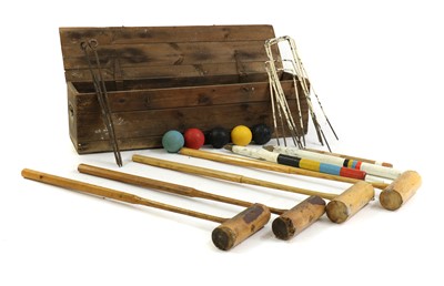 Lot 351 - A lawn croquet set
