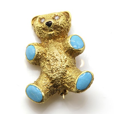 Lot 210 - An 18ct gold diamond and enamel teddy bear brooch, by Tom O'Donahue, c.1980