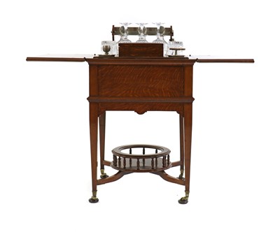 Lot 328 - An Edwardian oak drinks table