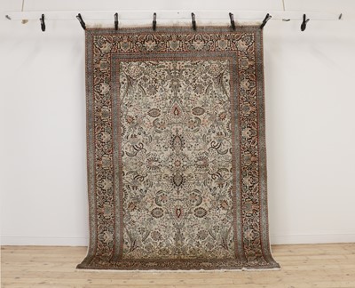Lot 279 - A silk Kirman rug