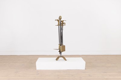 Lot 112 - A set of modernist brass fire tools