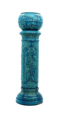 Lot 245 - A Burmantofts porcelain jardiniere and stand