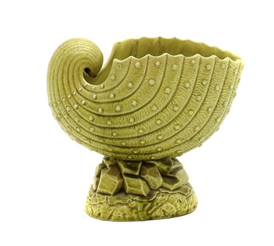 Lot 87 - A Burmantofts Faience green glazed spoon warmer