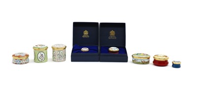 Lot 190 - A collection of eight Halcyon Days enamel pill boxes