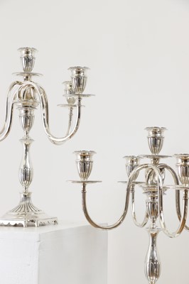 Lot 122 - A pair of silver five-light candelabra