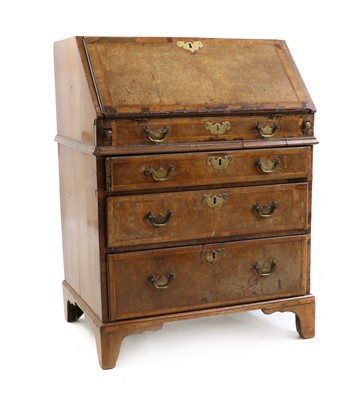 Lot 493 - A George III crossbanded yew wood bureau
