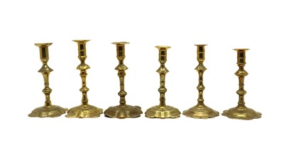 Lot 342 - Six Georgian brass candlesticks