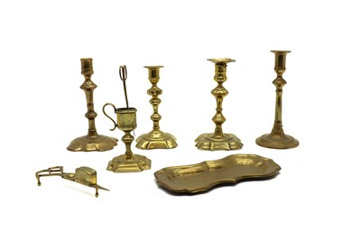 Lot 351 - A small brass standing snuffer and stand