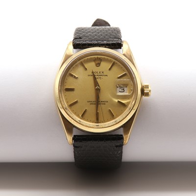 Lot 519 - A gentlemen's 9ct gold Rolex Oyster Perpetual date automatic strap watch