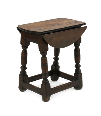 Lot 431 - An oak joint stool table