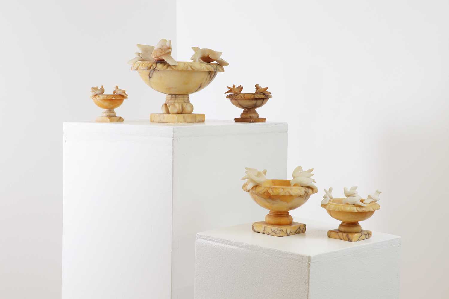 Lot 14 - Five alabaster urns