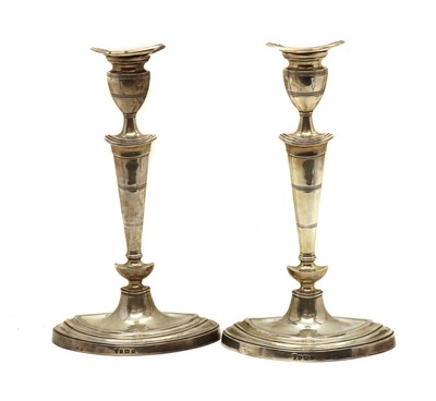 Lot 3 - A pair of George V silver candlesticks