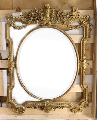 Lot 452 - A large and ornate gilt gesso wall mirror