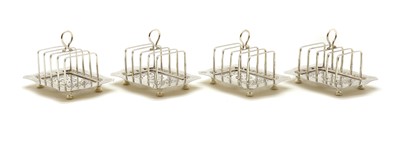 Lot 20 - A set of four Victorian silver five-bar toast racks