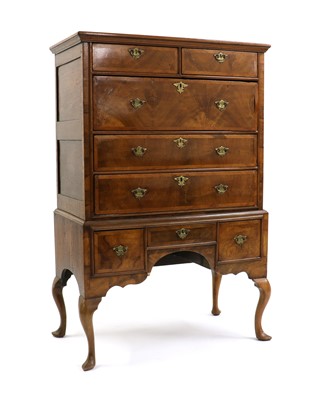 Lot 405 - An 18th Century walnut chest on stand