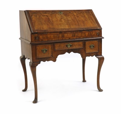 Lot 407 - A Queen Anne style walnut bureau on stand