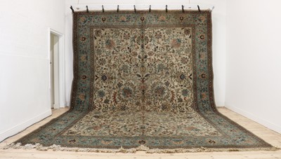 Lot 393 - A large Kashan carpet