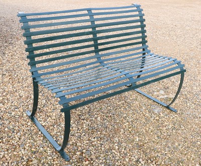Lot 551 - A cast iron bench