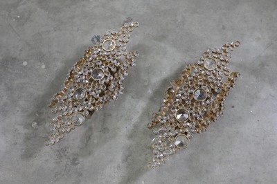 Lot 327 - A pair of German gilt-brass wall appliqués