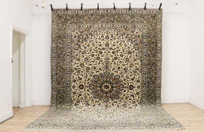 Lot 386 - A Kashan carpet
