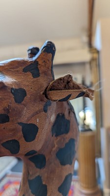 Lot 138 - A pair of painted hide figures of giraffes